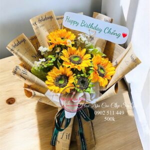 Hướng dương lụa+ giấy báo